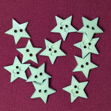 Description: Classic Star shaped buttons
Color: Seafoam Green
Material: Polyester
Type: 2 hole
Size: 5/8in (15mm)