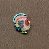Turkey Button
Color: red head, Brown wing, yellow feet
Material: Polyester
Type: Shank
Size: 7/8in (22mm)