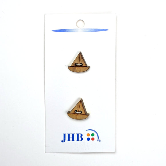 Set of two wooden sail boat buttons.