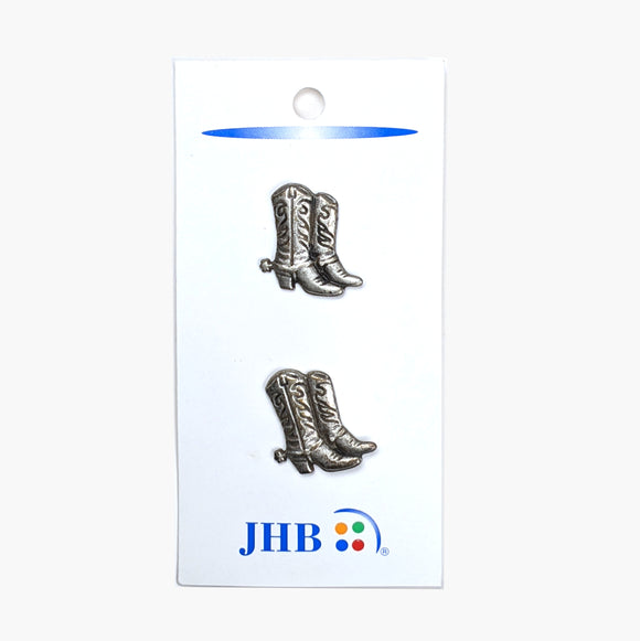 Pair of silver cowboy boot buttons.
