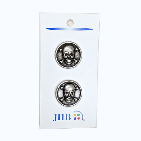 Set of two circle buttons with skull & crossbone image. 